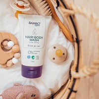 Bambo Nature Hair and Body Wash on a towel in a basket